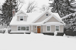 A home covered in snow